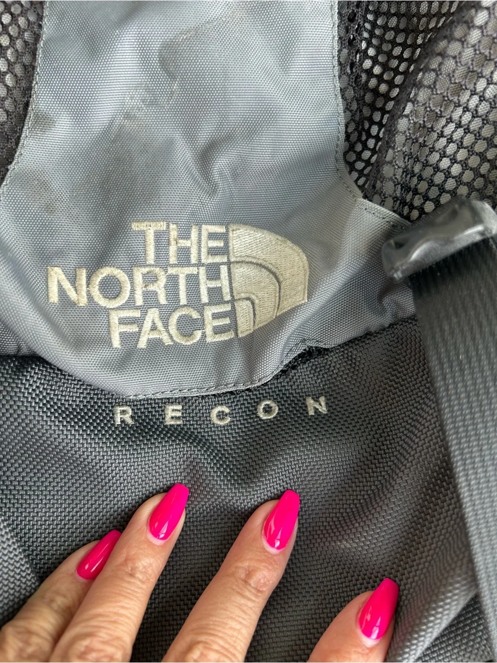 The North Face Gray and Black Backpack with Mesh Pockets